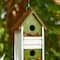 Glitzhome® 18" Distressed Wood Cottage with Shutter Texture Birdhouse